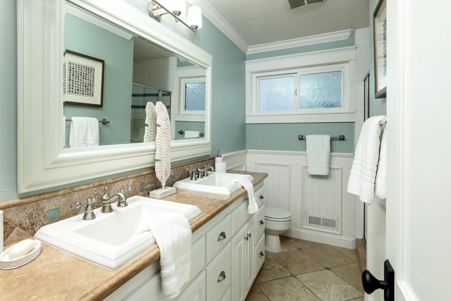 970 Gest Drive Mountain View, CA 94040 - Photo 32 of 53 a bathroom with a granite countertop sink mirror vanity and toilet