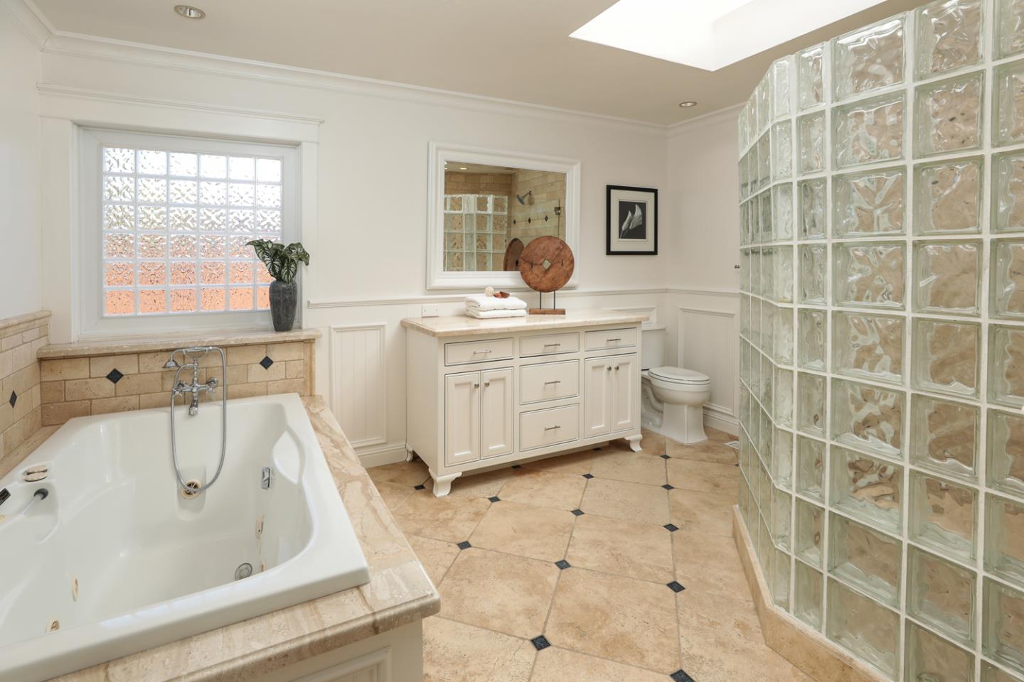 970 Gest Drive Mountain View, CA 94040 - Photo 37 of 53 a bathroom with a tub sink and mirror