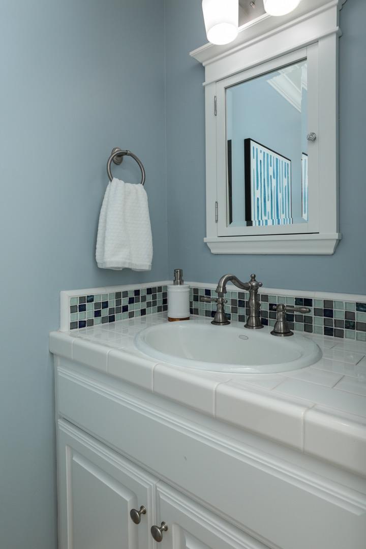 970 Gest Drive Mountain View, CA 94040 - Photo 44 of 53 a bathroom with a sink and a mirror