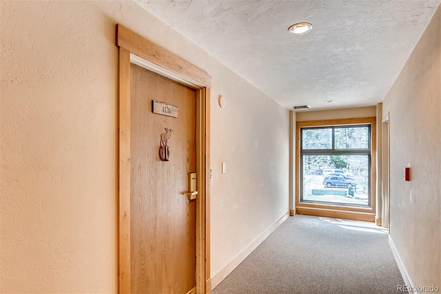 1937 Soda Ridge Road, Unit 1126 Dillon, CO 80435 - Photo 23 of 42 a view of an empty room and window