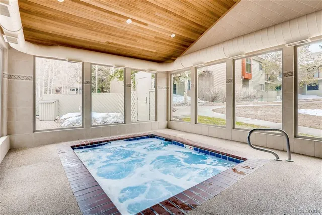 a view of a swimming pool with a patio