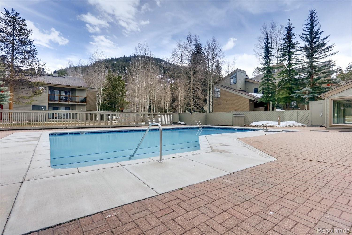 1937 Soda Ridge Road, Unit 1126 Dillon, CO 80435 - Photo 34 of 42 a view of a house with a snow in the yard
