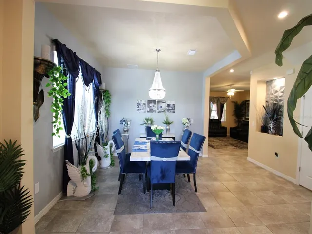 a view of a dining room with furniture