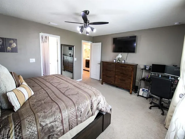 an aerial view of a house with a outdoor space