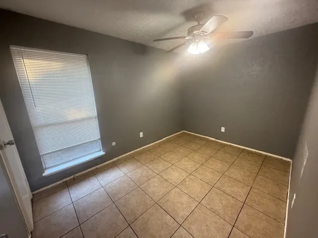 a bathroom with a sink a tub and a mirror