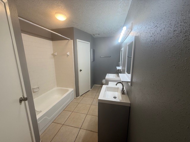 22122 Diane Drive Spring, TX 77373 - Photo 6 of 13 a bathroom with a sink a tub and a mirror