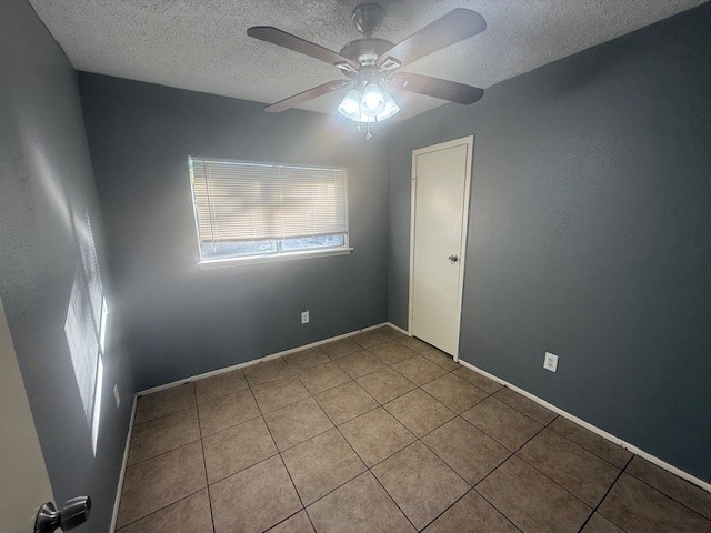22122 Diane Drive Spring, TX 77373 - Photo 9 of 13 a view of an empty room with a window