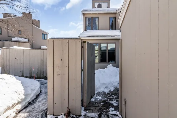 a view of a house with a small yard