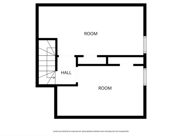 a picture of a bench in front of a window