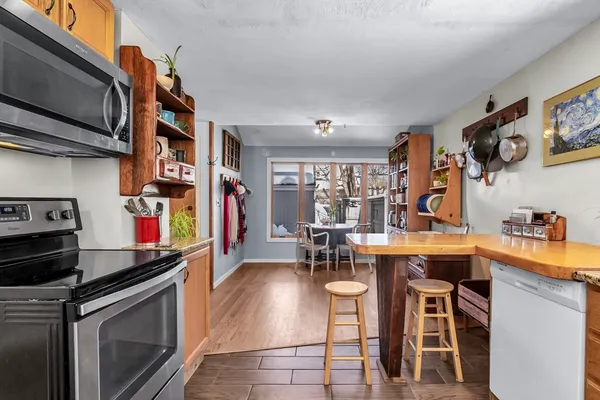 a kitchen that has a lot of cabinets in it