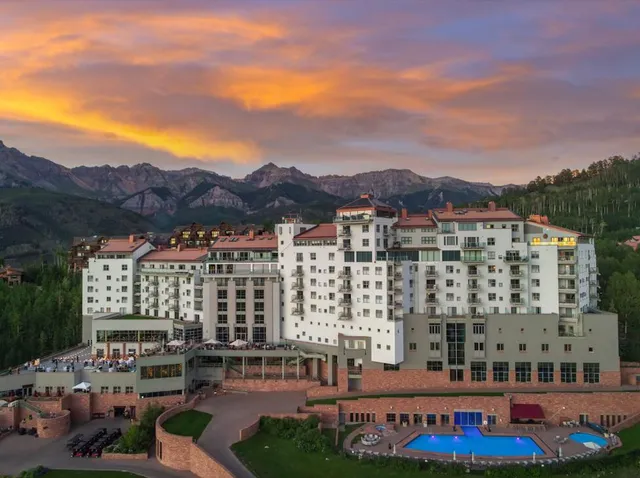 a view of city with tall buildings