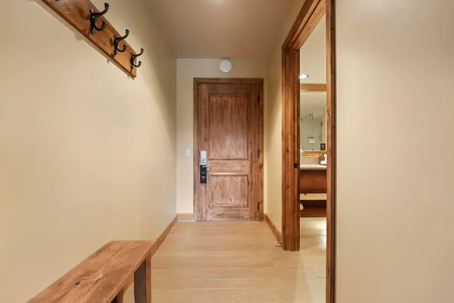 a view of a hallway with a white walls