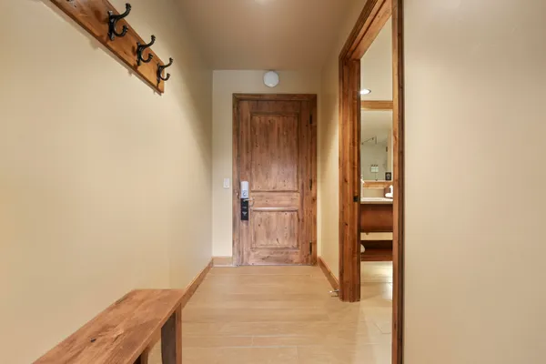 a view of a hallway with a white walls