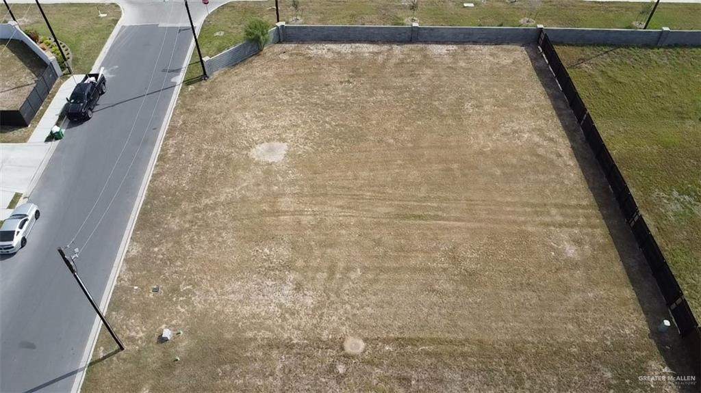 a view of balcony with wooden floor