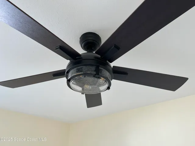 a close view of shoes stand and utility room