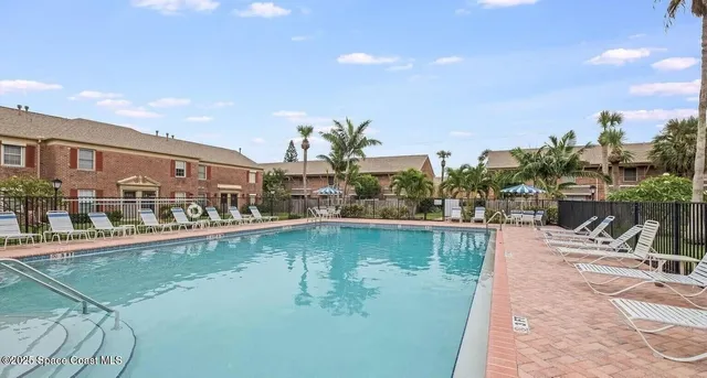 a view of a lake with a house
