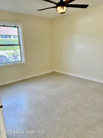 a view of a room with rack on the wall