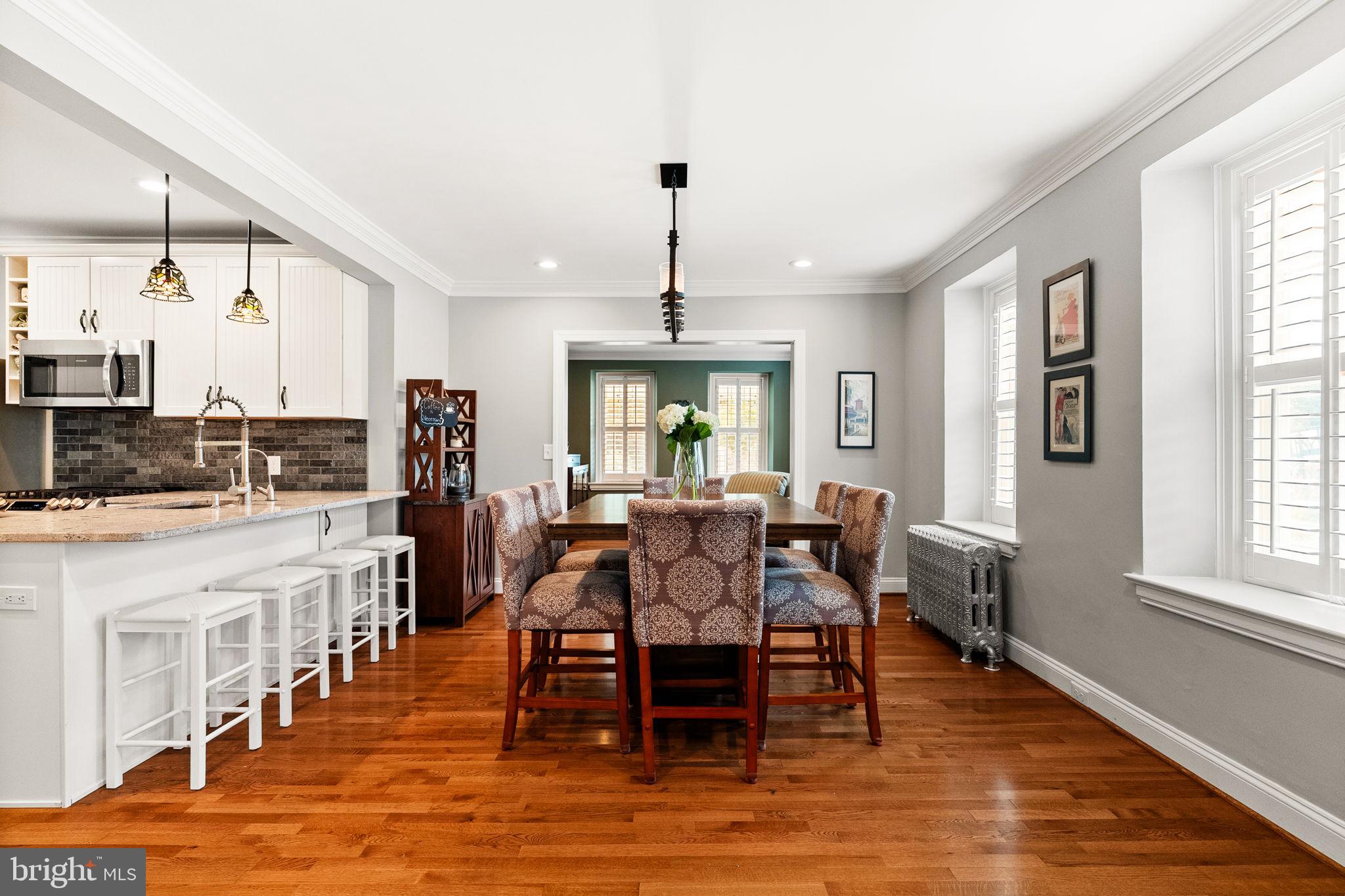 337 Old Lancaster Road Devon, PA 19333 - Photo 14 of 56 a view of a dining room with furniture window and wooden floor