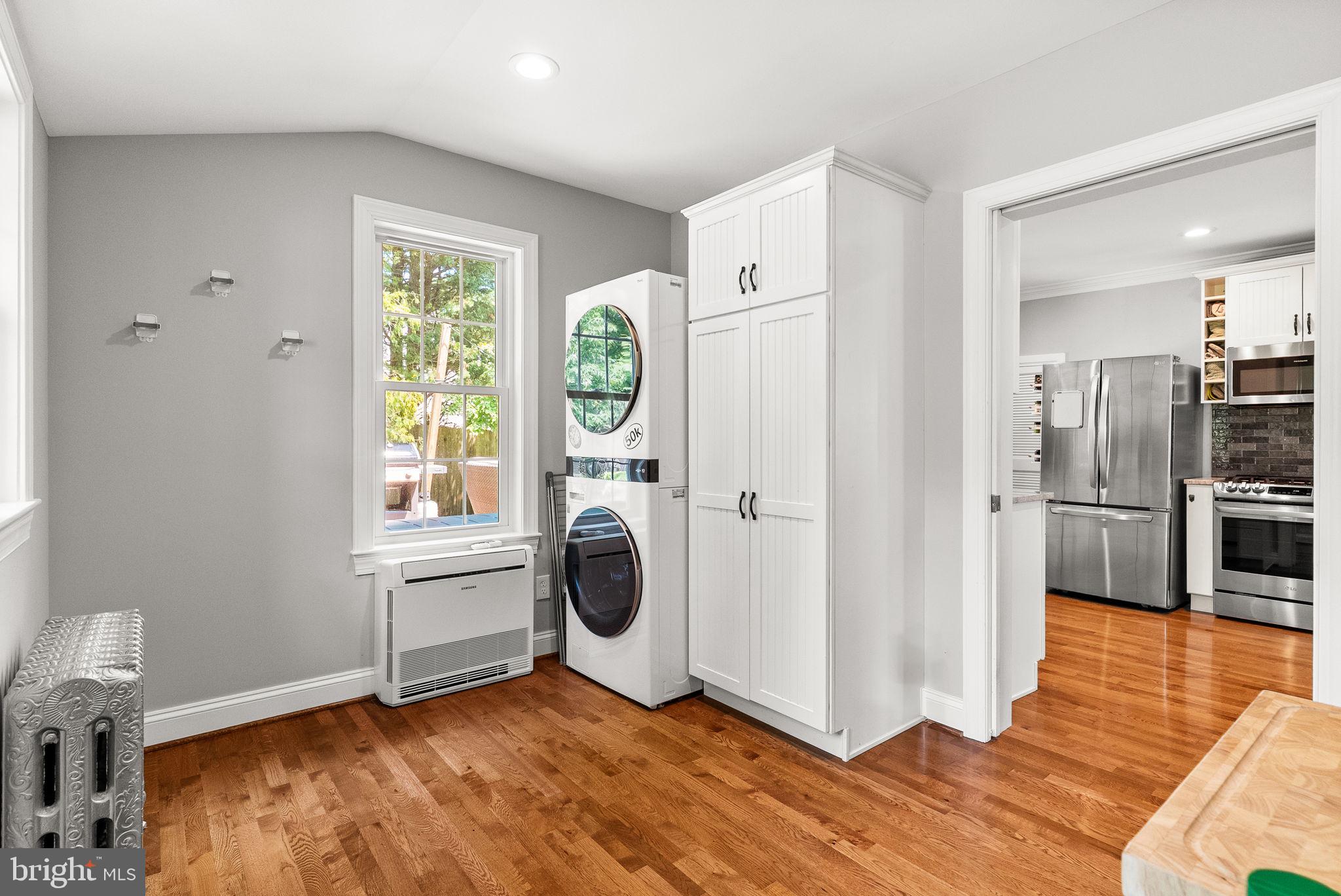 337 Old Lancaster Road Devon, PA 19333 - Photo 28 of 56 a view of a kitchen with fridge and wooden floor