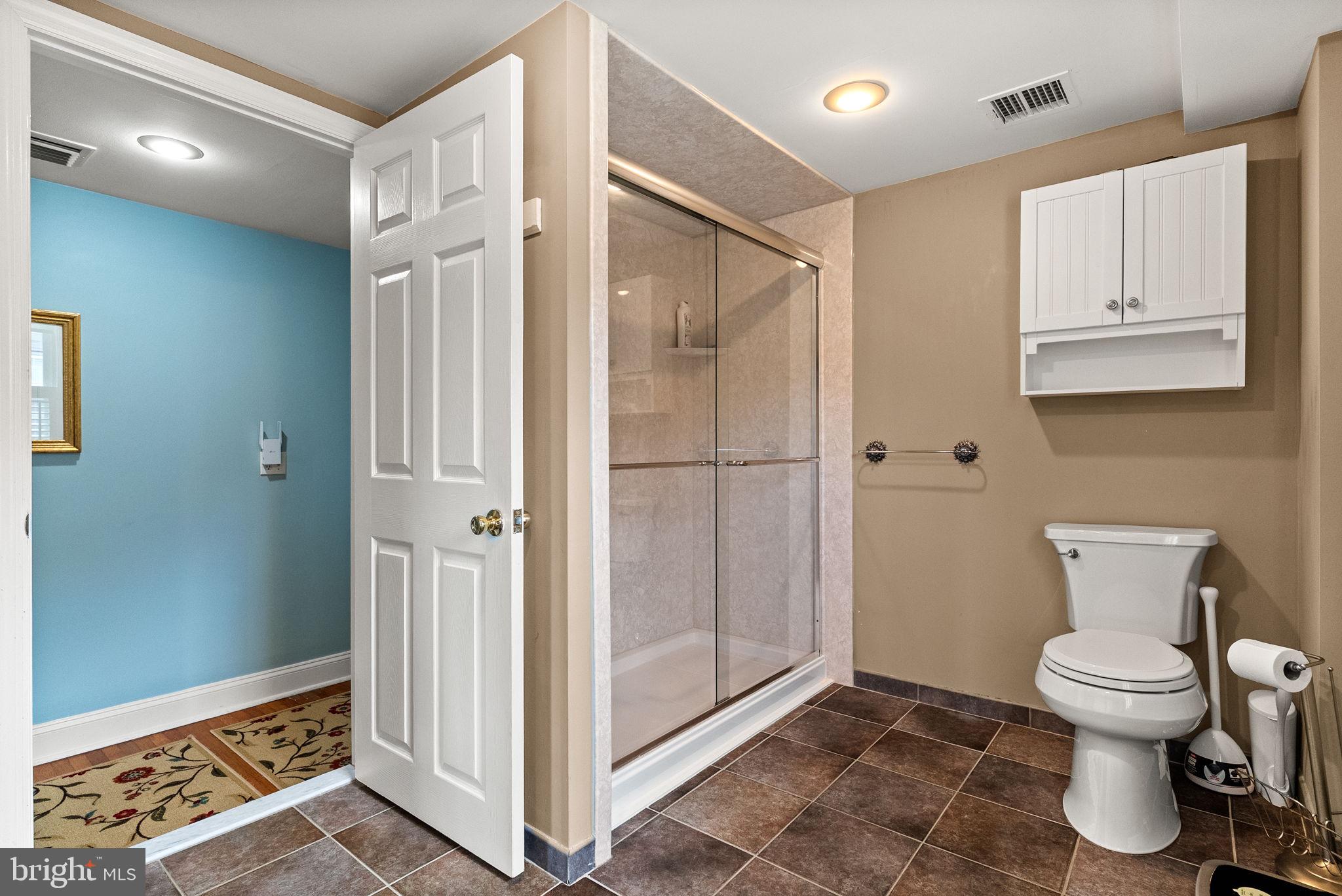 337 Old Lancaster Road Devon, PA 19333 - Photo 37 of 56 a bathroom with a toilet and a shower