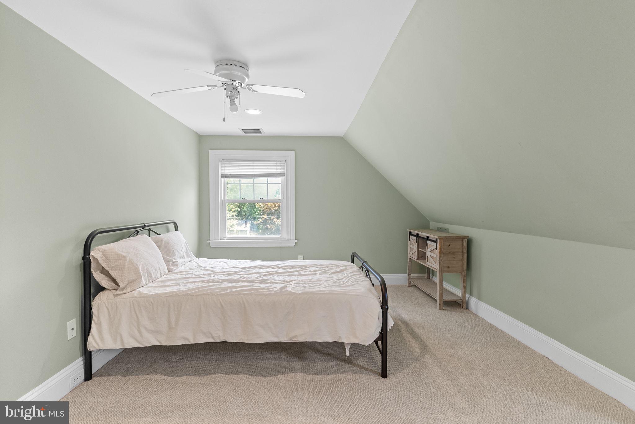 337 Old Lancaster Road Devon, PA 19333 - Photo 40 of 56 a bedroom with a bed and window