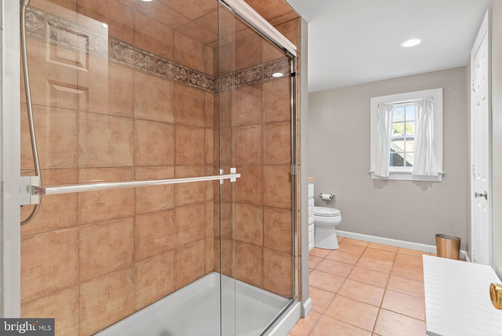 337 Old Lancaster Road Devon, PA 19333 - Photo 41 of 56 a bathroom with a shower