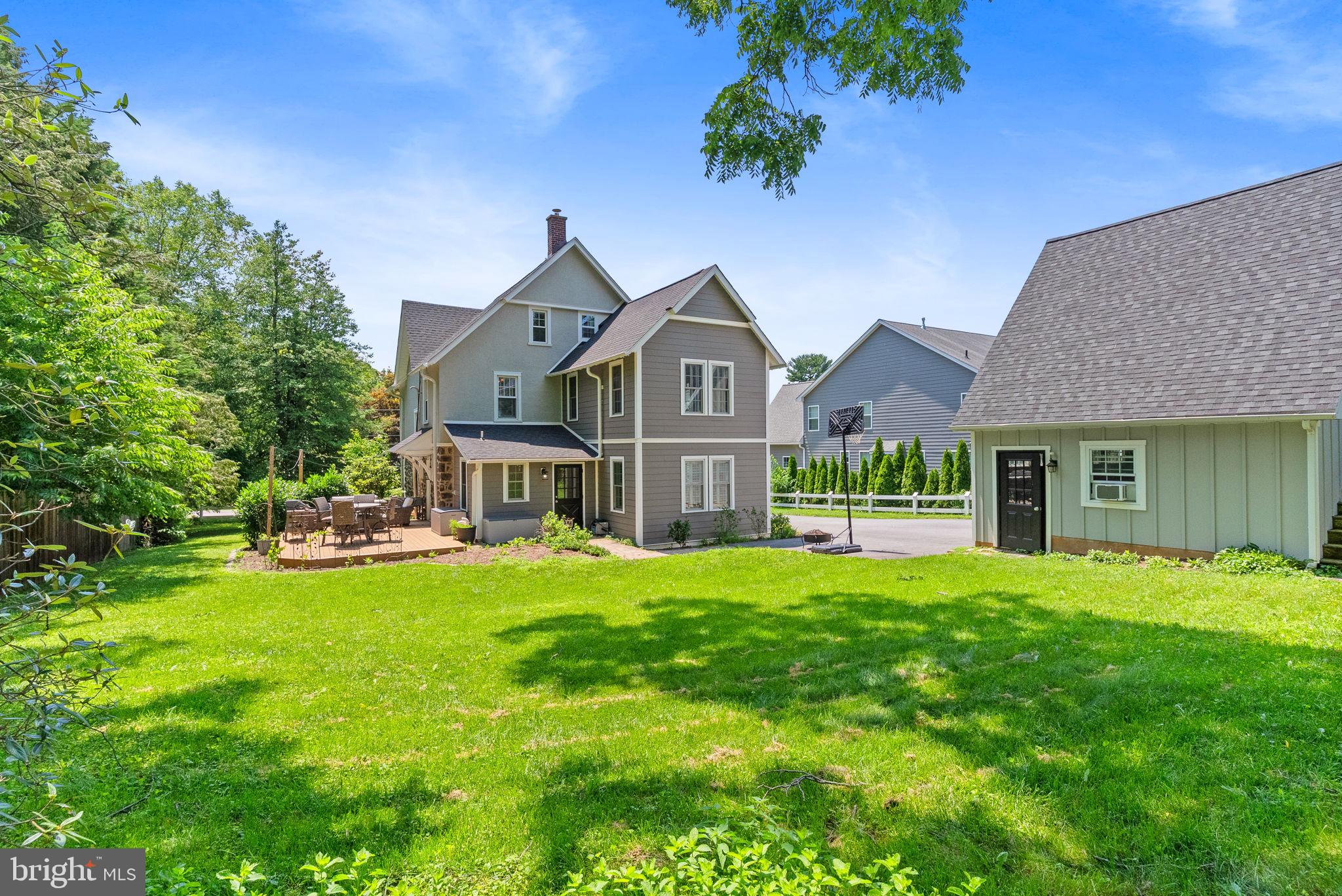 337 Old Lancaster Road Devon, PA 19333 - Photo 51 of 56 a front view of a house with a garden
