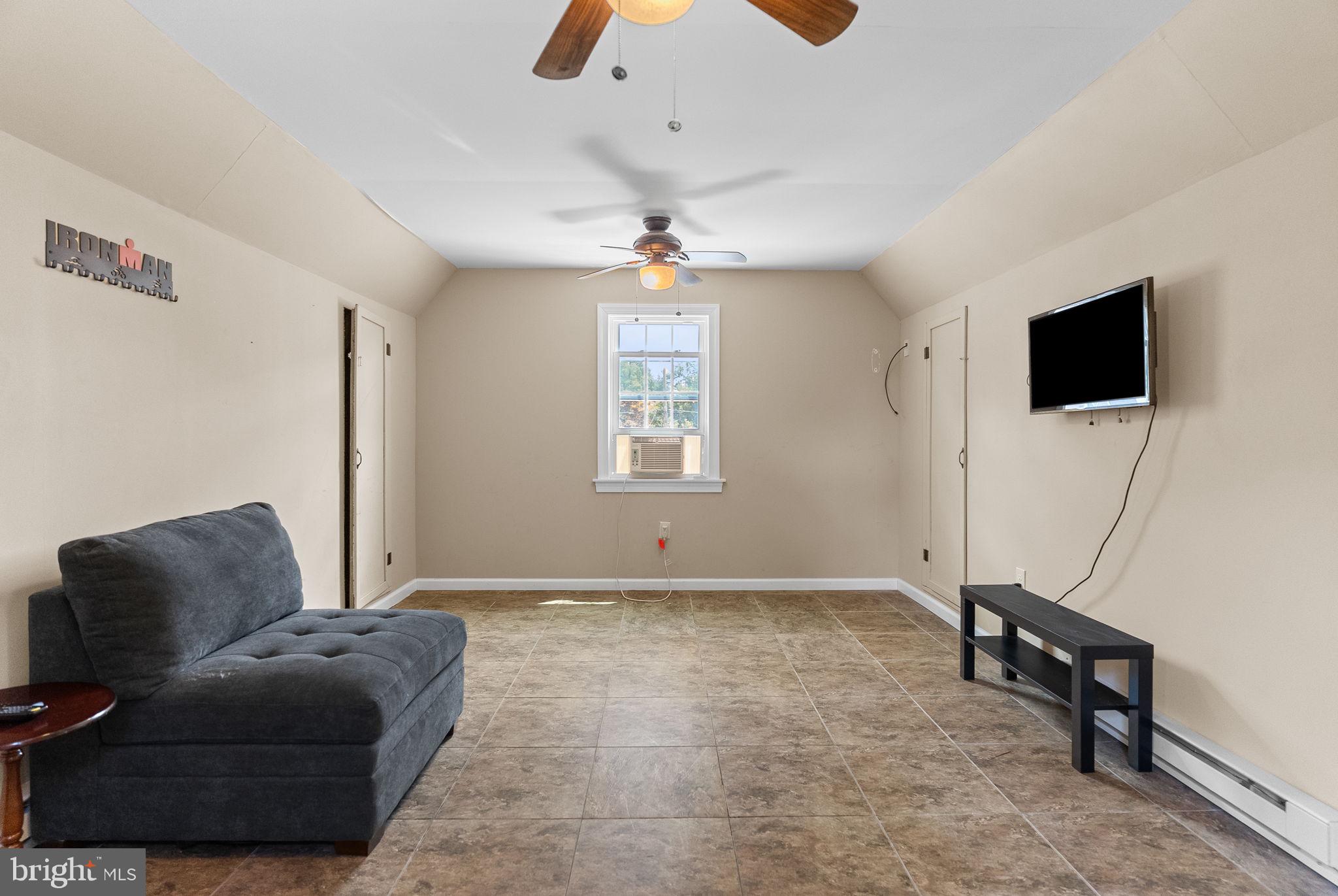 337 Old Lancaster Road Devon, PA 19333 - Photo 53 of 56 a living room with furniture and a flat screen tv