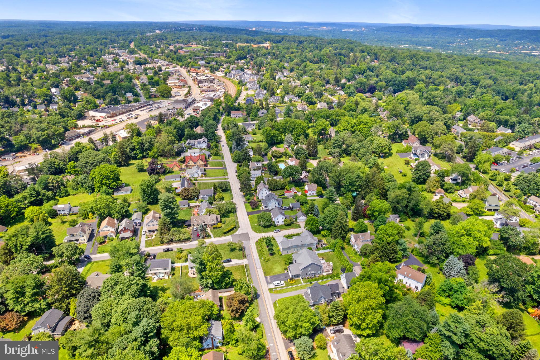 337 Old Lancaster Road Devon, PA 19333 - Photo 56 of 56 an aerial view of residential houses with outdoor space and trees