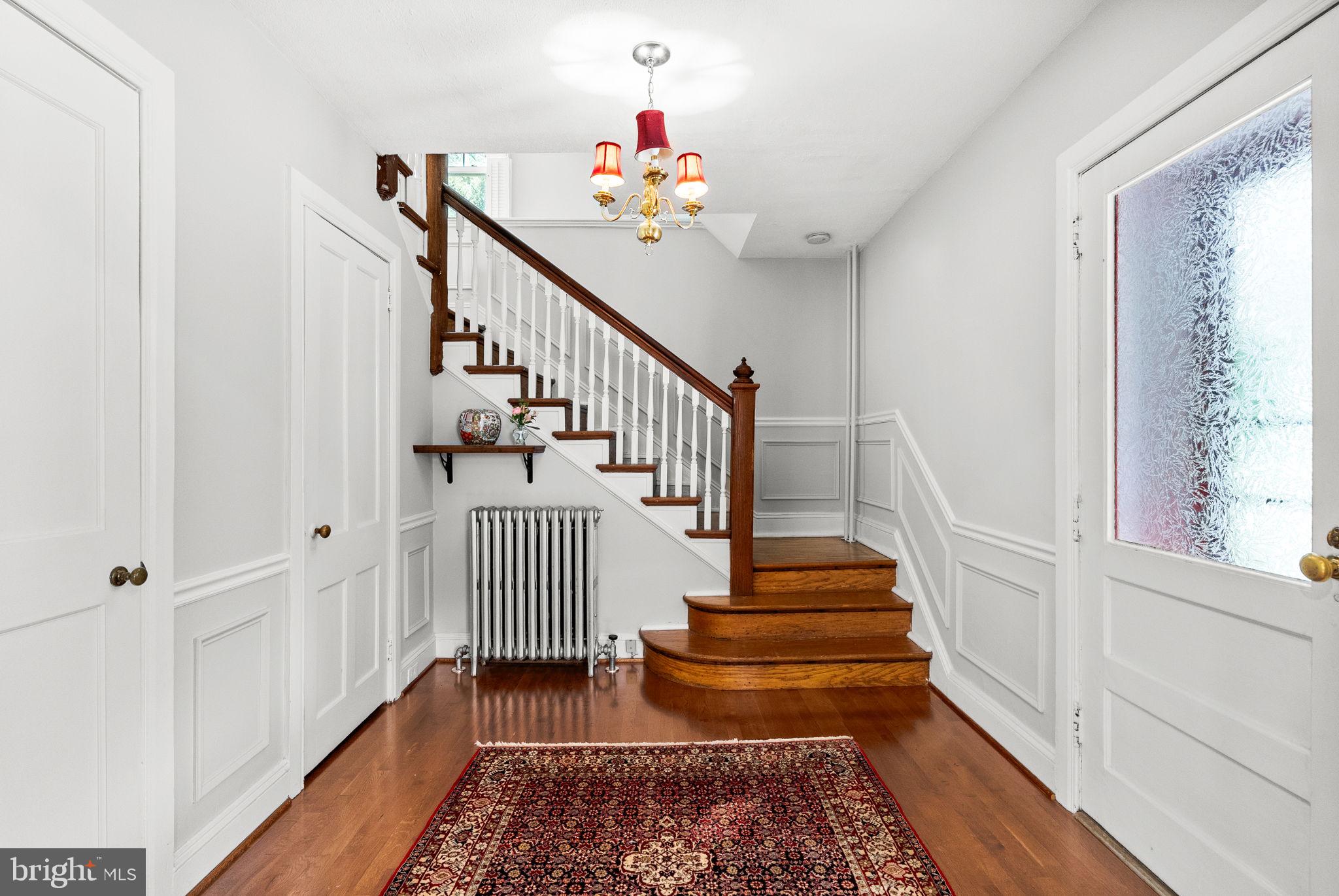 337 Old Lancaster Road Devon, PA 19333 - Photo 7 of 56 a view of entryway and hall with wooden floor