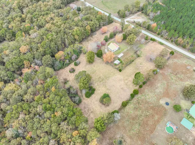 a view of a wooden floor with a yard