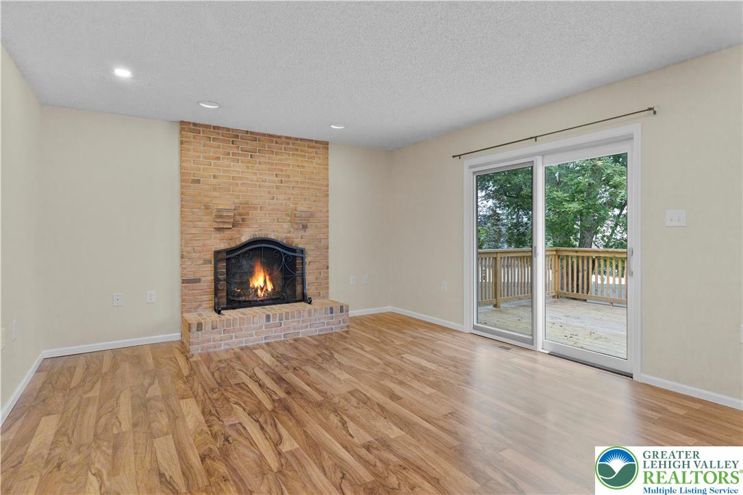 3919 Carter Road Bethlehem, PA 18020 - Photo 10 of 39 Spacious Living Room to Backyard