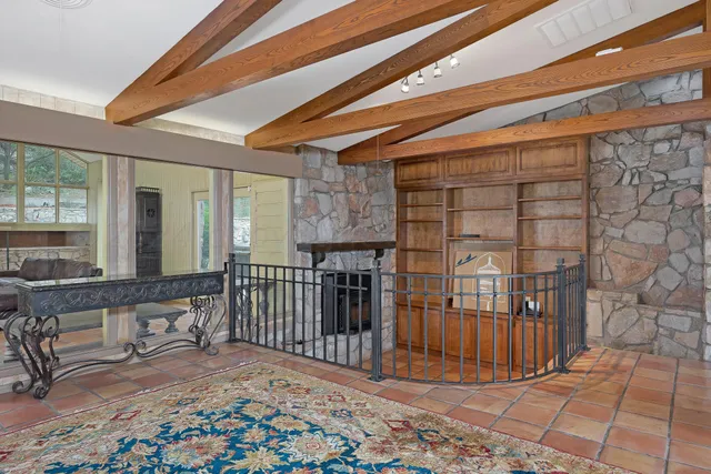 a view of a balcony with furniture