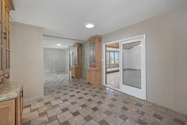 a view of a bathroom with a sink and a shower