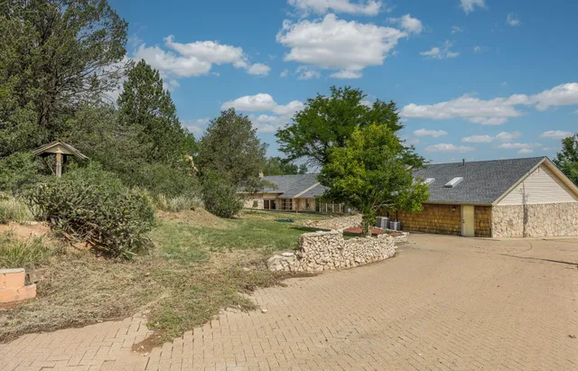 a view of a golf course with a lake