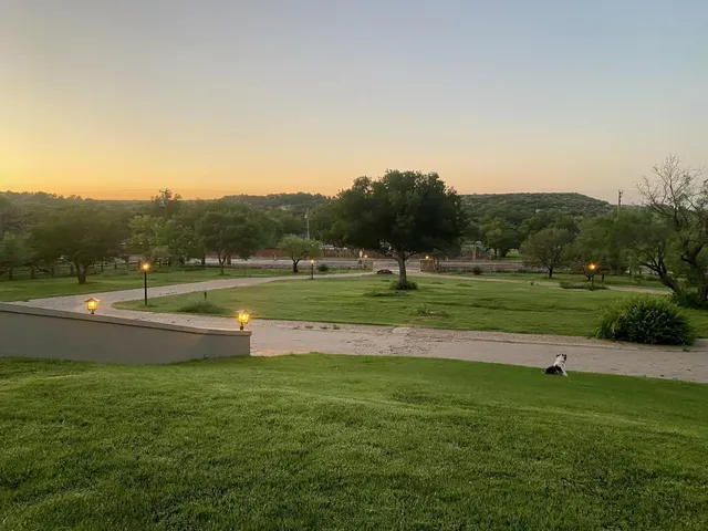 a view of a fireplace with wooden floor