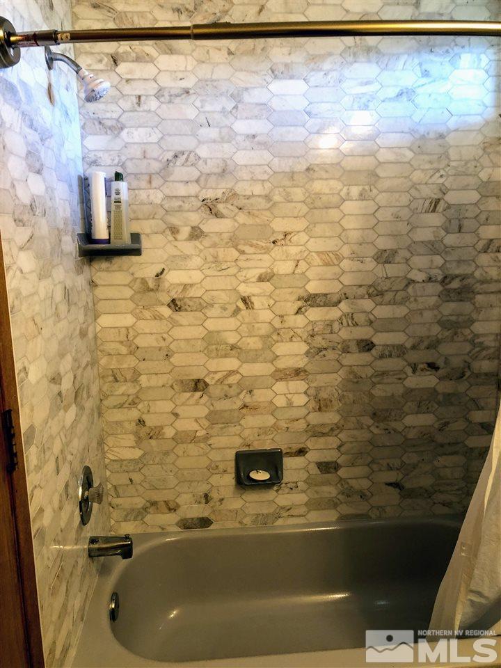 602 Talus Way Reno, NV 89503 - Photo 13 of 25 a bathroom with a shower