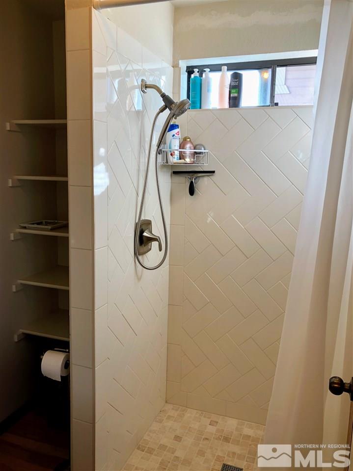602 Talus Way Reno, NV 89503 - Photo 8 of 25 a bathroom with a shower