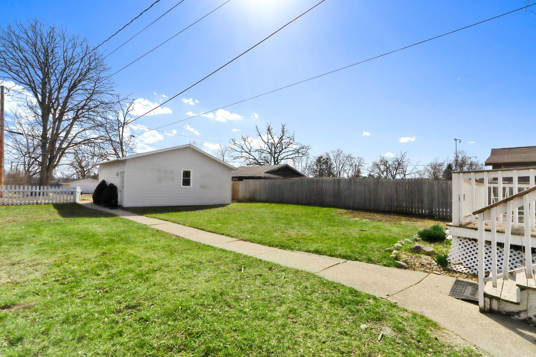 408 East Geneva Street Delavan, WI 53115 - Photo 2 of 29 Great Fenced Yard & 2-Car Garage
