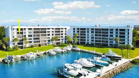 a view of a swimming pool with a lounge chairs