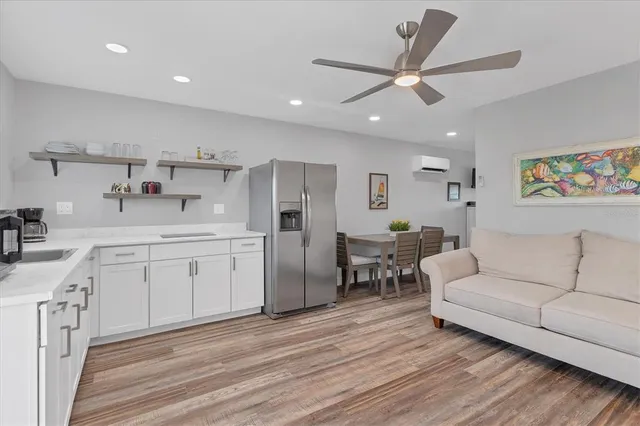 a view of a chairs and table on the deck