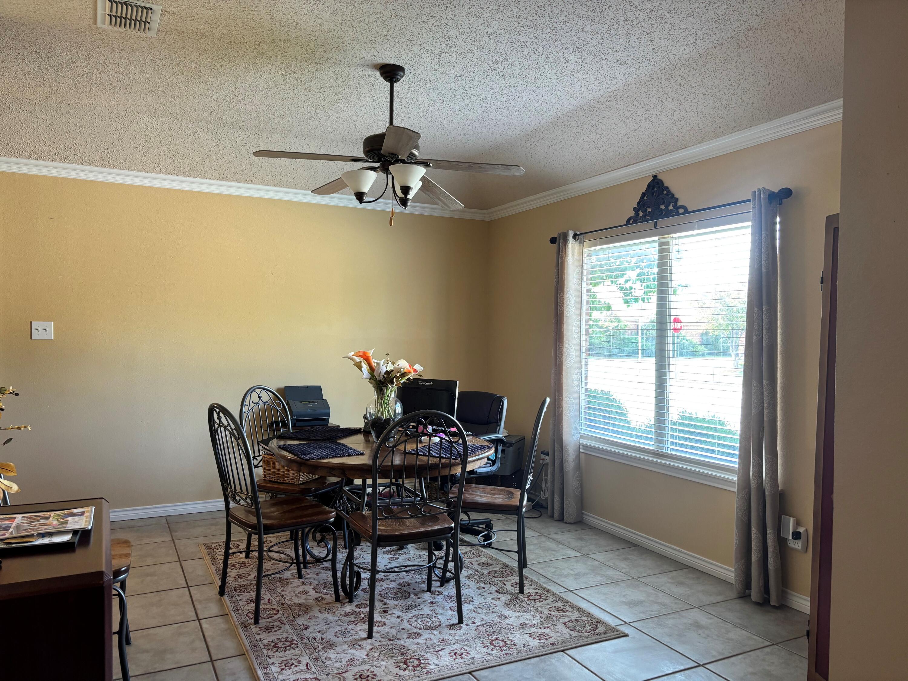 3713 106th Street Lubbock, TX 79423 - Photo 2 of 22 Front dining area