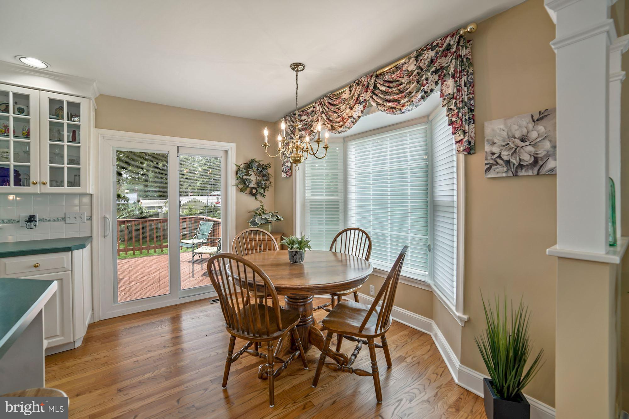 217 Rolling Road Gaithersburg, MD 20877 - Photo 14 of 38 Dining Room with new bay window and slider to deck