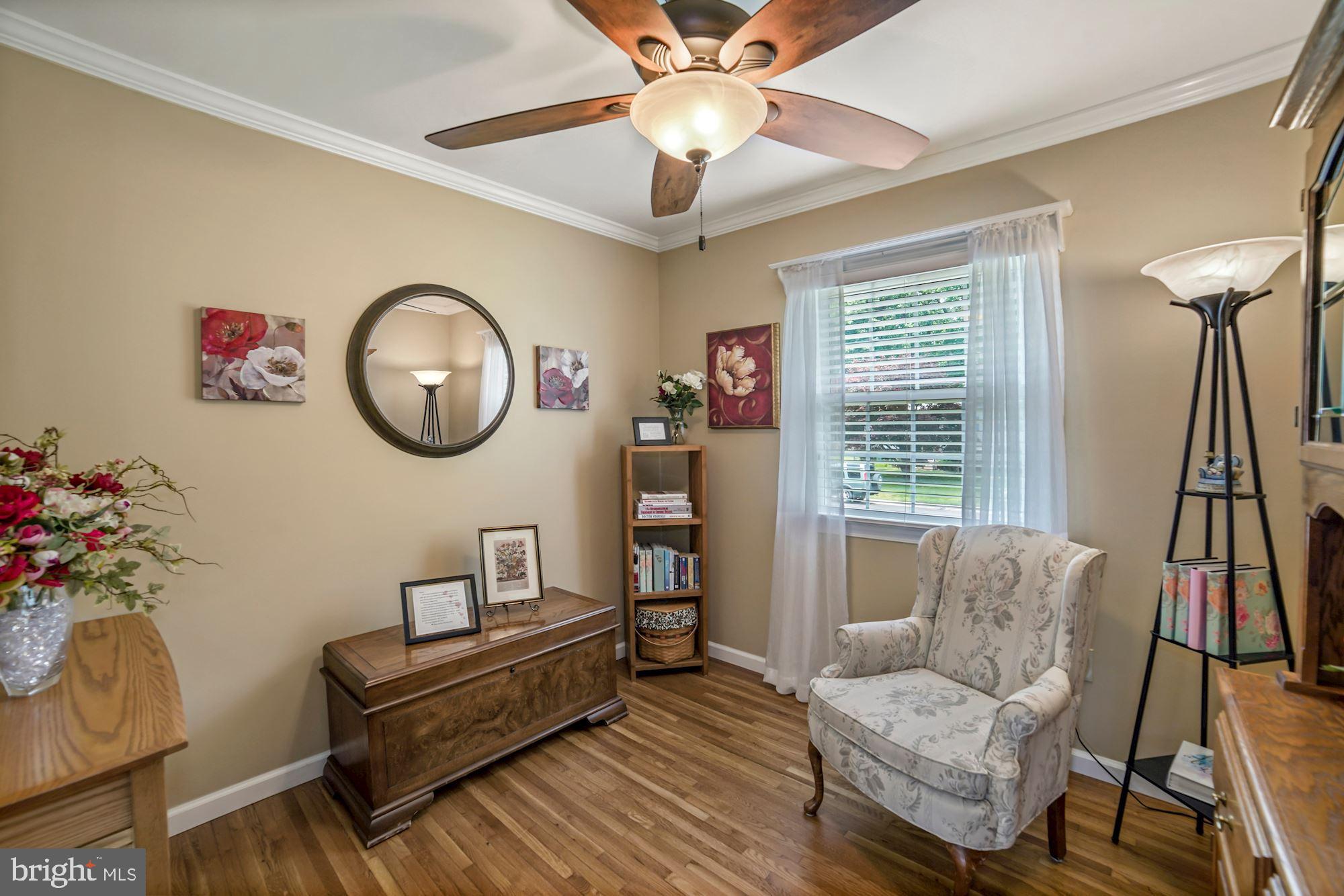 217 Rolling Road Gaithersburg, MD 20877 - Photo 22 of 38 Bedroom #4 with new ceiling fan and hardwood floor