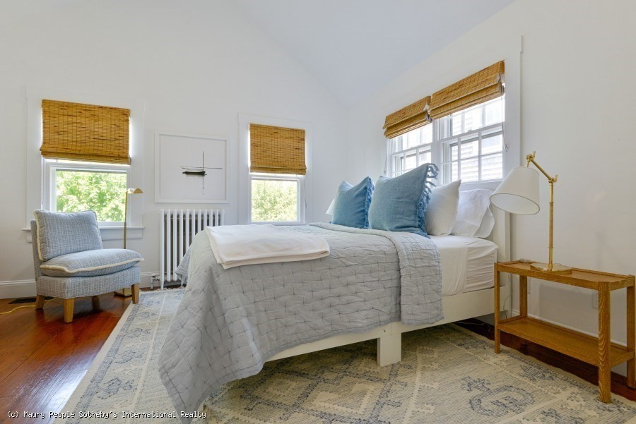 3 North Beach Street Nantucket, MA 02554 - Photo 12 of 13 a bedroom with a bed and a window