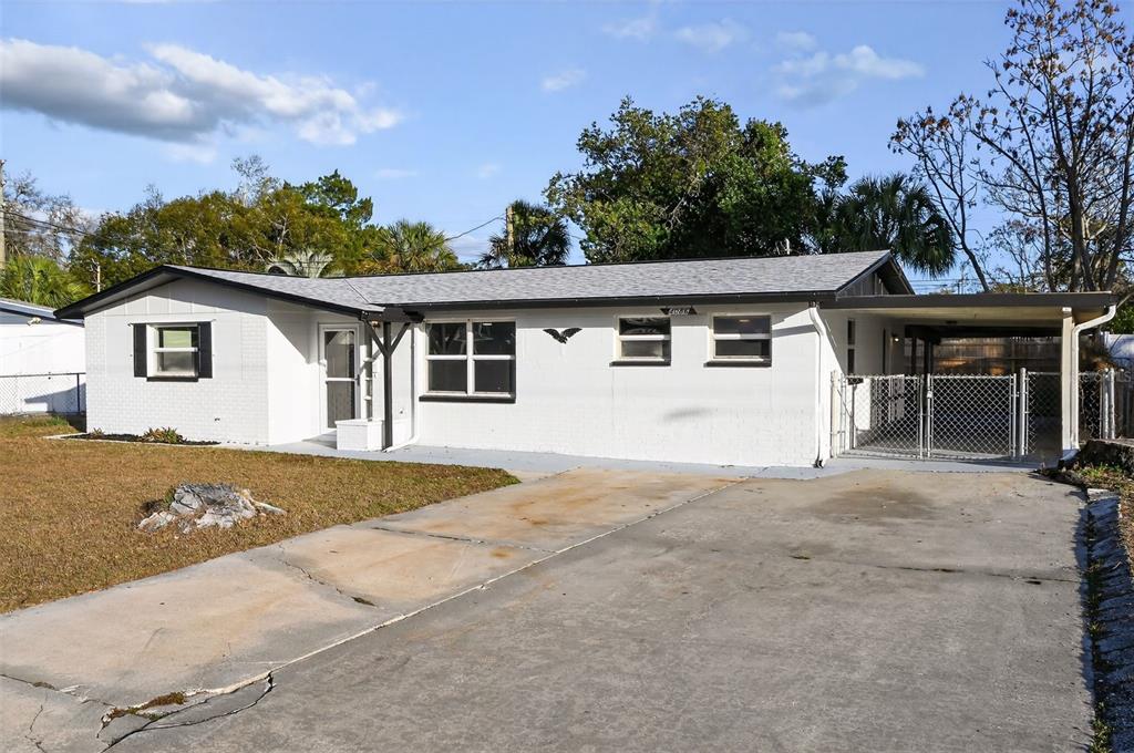 4086 Arrowhead Avenue Spring Hill, FL 34606 - Photo 3 of 21 a view of a house with a outdoor space