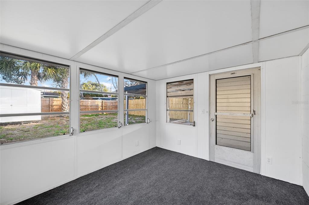 4086 Arrowhead Avenue Spring Hill, FL 34606 - Photo 10 of 21 a view of an empty room with a window