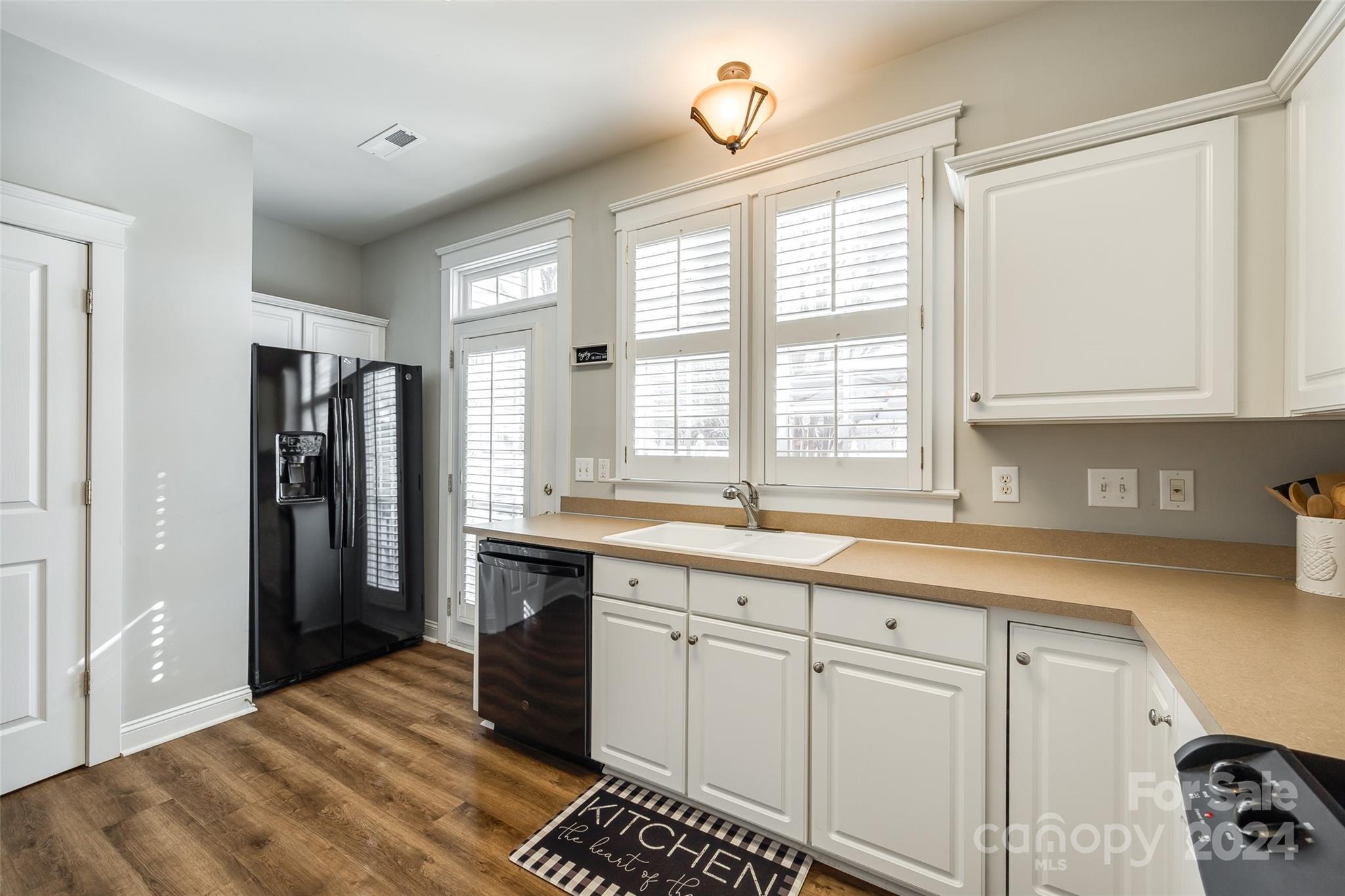 308 Elis Way Fort Mill, SC 29708 - Photo 12 of 29 a kitchen with a sink stove and refrigerator