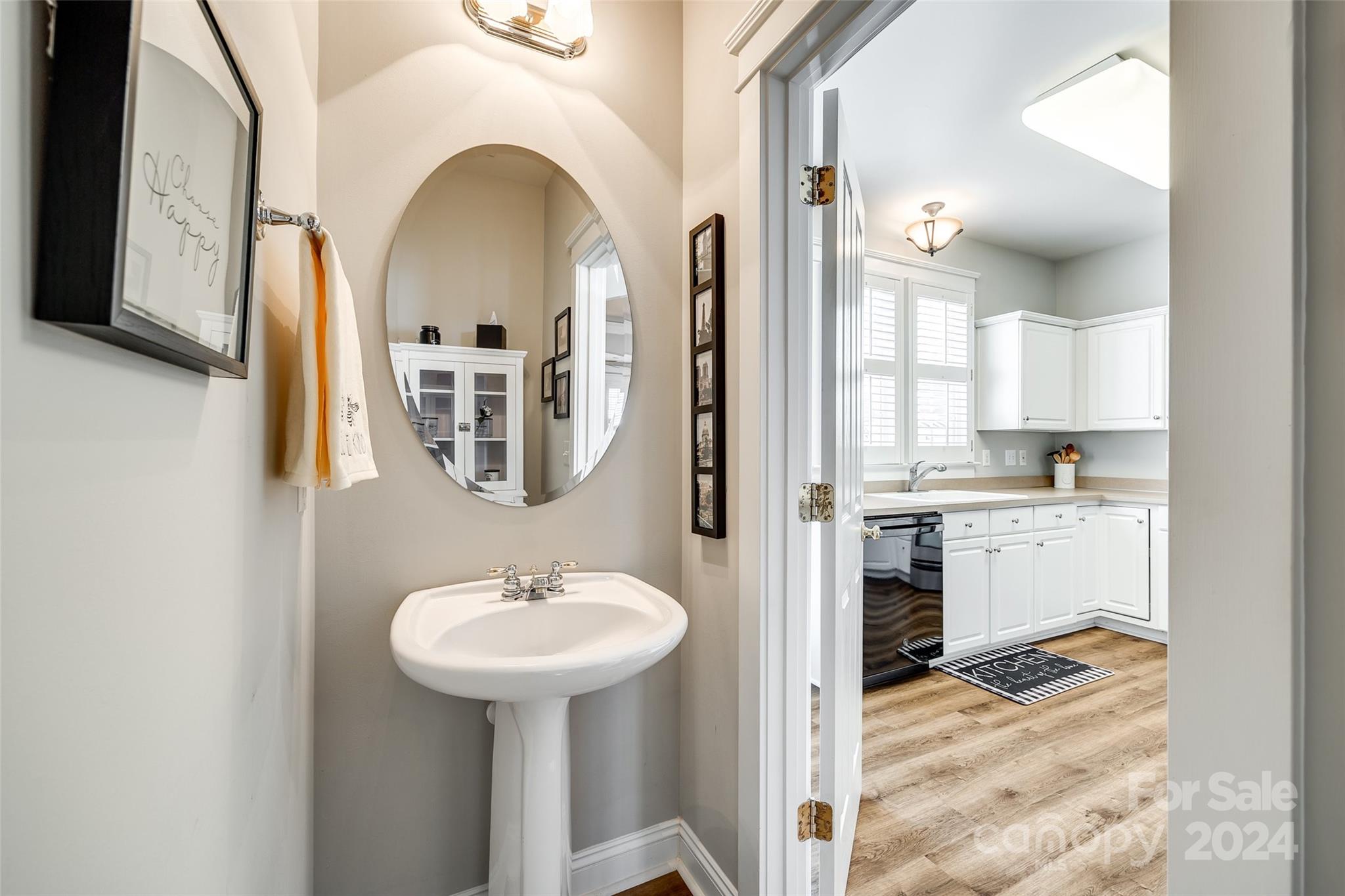 308 Elis Way Fort Mill, SC 29708 - Photo 13 of 29 a en suite bathroom with a sink and a mirror