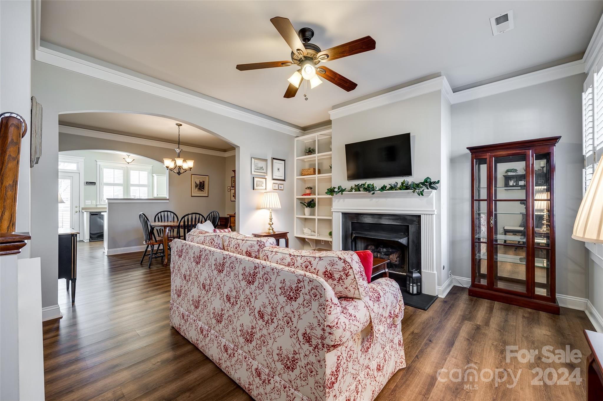 308 Elis Way Fort Mill, SC 29708 - Photo 4 of 29 a living room with furniture a fireplace and a flat screen tv